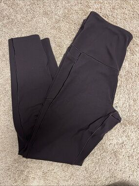 RHONE brown revive pockets 7/8 Leggings
